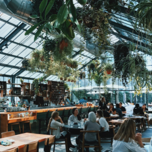 a picture of a restaurant that looks like a greenhouse